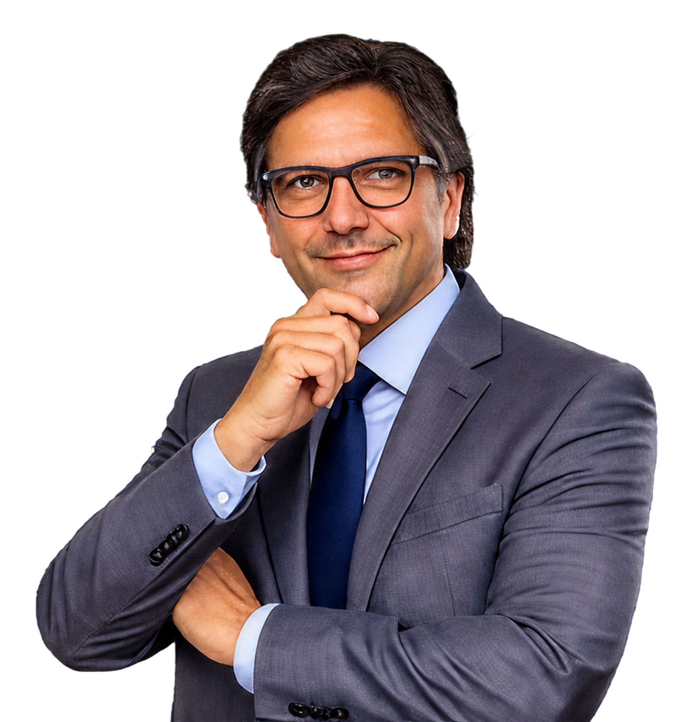 Smiling man in a grey suit, blue shirt, and glasses, with his hand on his chin, looking confident.